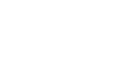 オートロック操作盤の手元を照らすスポット照明とモザイクタイルが、スマートなアルコーブ。両側の飾り柱内部をパイプスペースとし、裏にはメールコーナーを配しました。天井までの木調の扉は、内部への期待を高めながらも、ダイレクトには見せない、プライバシーに配慮したデザインとしています。