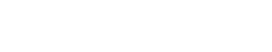 緑が映え木漏れ日を映すやわらかな白の佇まい