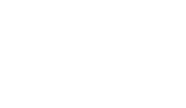 街並みの印象を明るくする洗練された建物を目指して、オフホワイトの外壁に木調格子と木々の緑が美しく映えるファサードをデザインしました。2方向オーバーハングによる、2層のコーナーバルコニーが、建物に伸びやかな表情をもたらしています。